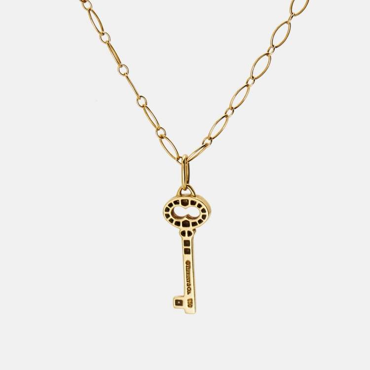 Pre Owned Tiffany & Co. Vintage Oval Key Diamond 18K Yellow Gold Mini Pendant Necklace