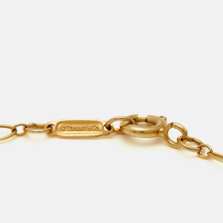 Pre Owned Tiffany & Co. Vintage Oval Key Diamond 18K Yellow Gold Mini Pendant Necklace