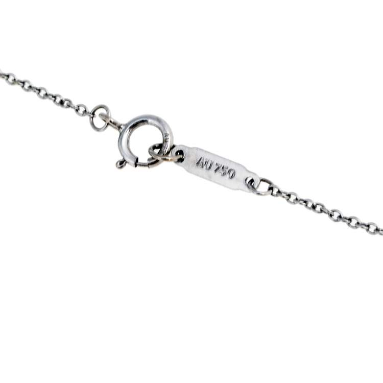 Pre Owned Tiffany & Co. Modern Key Round Key Diamond 18k White Gold Pendant Necklace