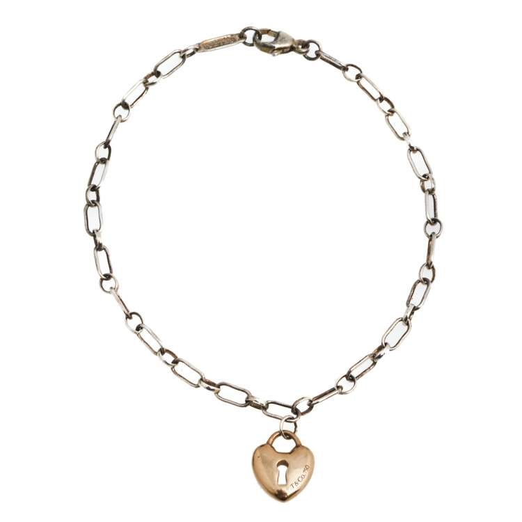 Pre Owned Tiffany & Co. 18k Rose Gold Heart Lock Sterling Silver Charm Bracelet