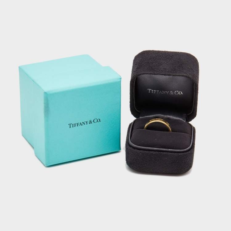 Pre Owned Tiffany & Co. Atlas Pierced Rubies 18k Yellow Gold Band Ring Size 55