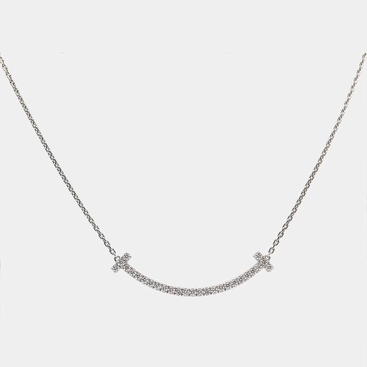 Tiffany T smile pendant in 18k white gold with diamonds, mini. | Tiffany &  Co.
