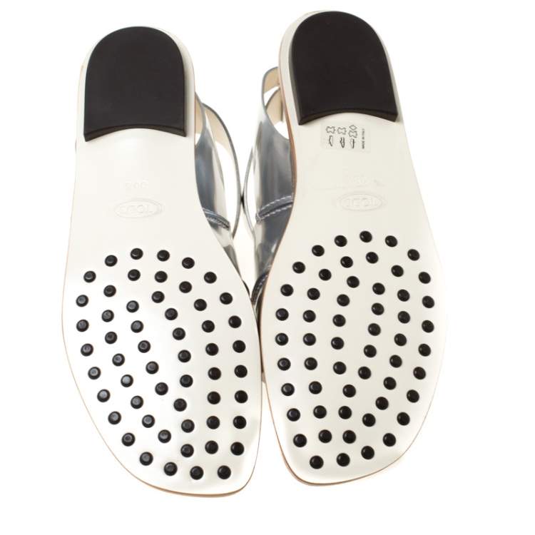 Pre Owned Tod's Metallic Silver Leather Cross Strap Flat Sandals Size 38.5