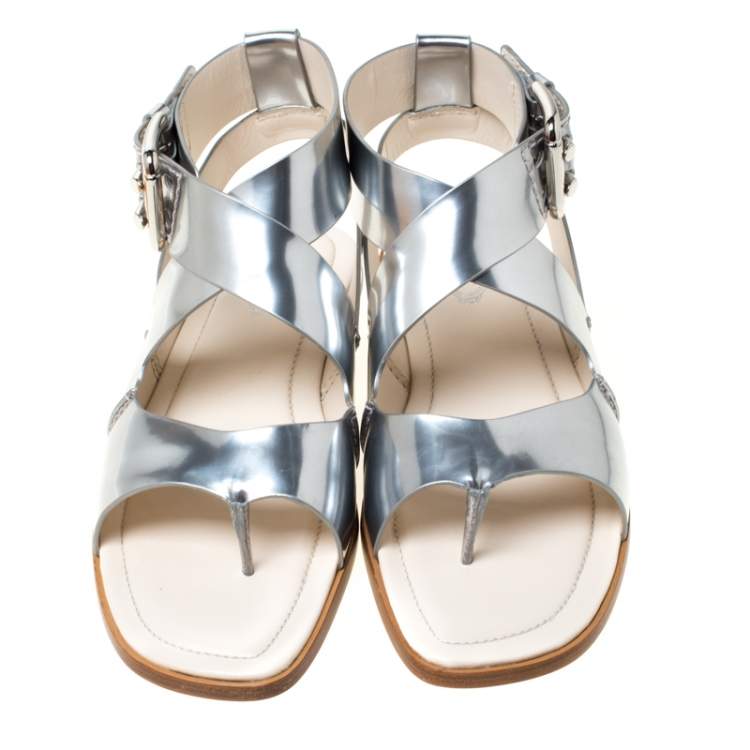 Pre Owned Tod's Metallic Silver Leather Cross Strap Flat Sandals Size 38.5
