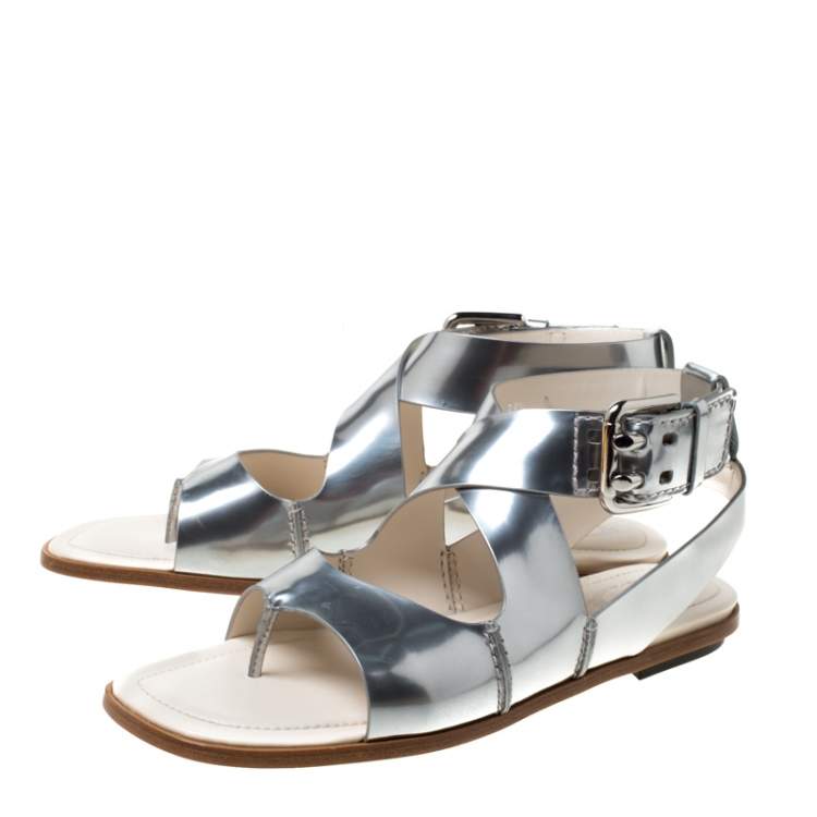Pre Owned Tod's Metallic Silver Leather Cross Strap Flat Sandals Size 38.5