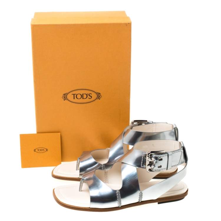 Pre Owned Tod's Metallic Silver Leather Cross Strap Flat Sandals Size 38.5
