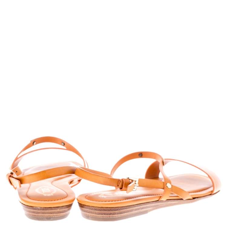Pre Owned Tod's Orange Leather Metal Logo Embellished Slingback Flat Sandals Size 38.5