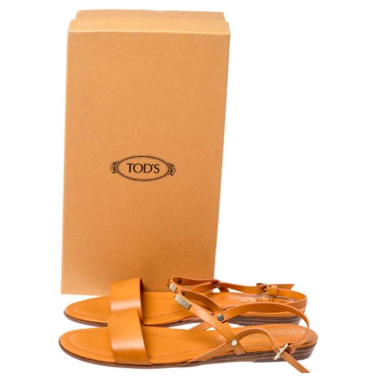 Pre Owned Tod's Orange Leather Metal Logo Embellished Slingback Flat Sandals Size 38.5