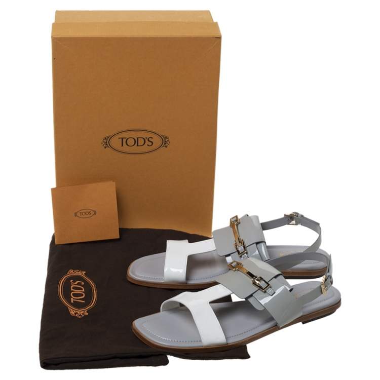 Pre Owned Tod's Grey/White Patent Leather T-Strap Buckle Detail Flat Sandals Size 39.5