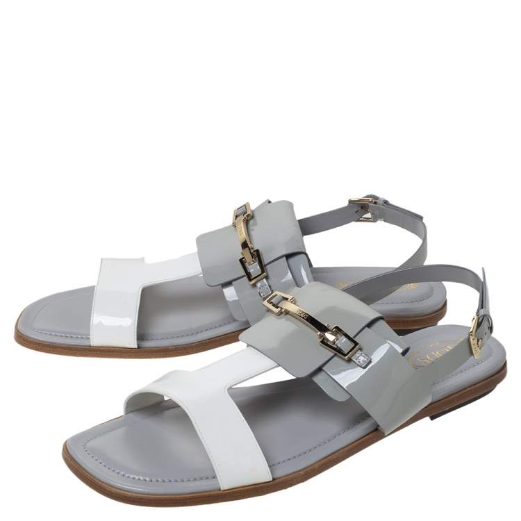 Pre Owned Tod's Grey/White Patent Leather T-Strap Buckle Detail Flat Sandals Size 39.5