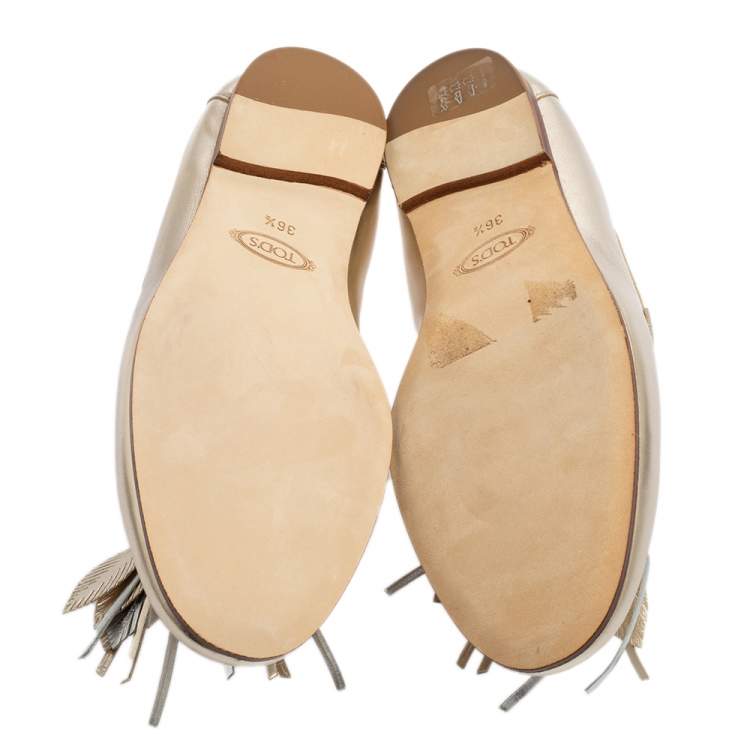 مملوكة مسبقًا Tod's Metallic Gold/Silver Leather Fringe Slip On Loafers Size 36.5