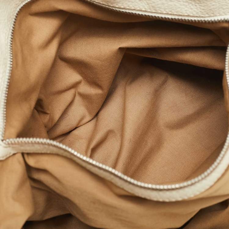 Pre Owned Tod's Off White Quilted Leather Drawstring Satchel