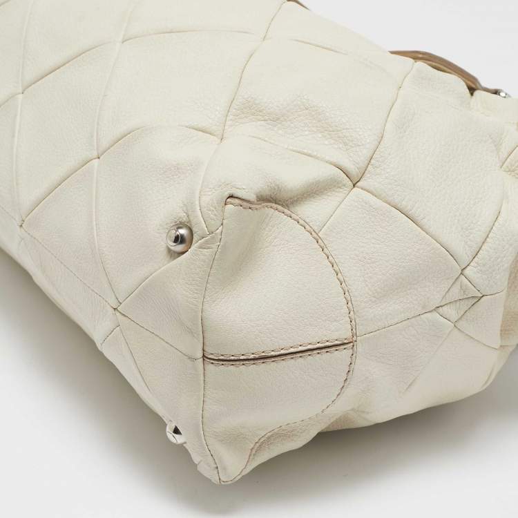 Pre Owned Tod's Off White Quilted Leather Drawstring Satchel