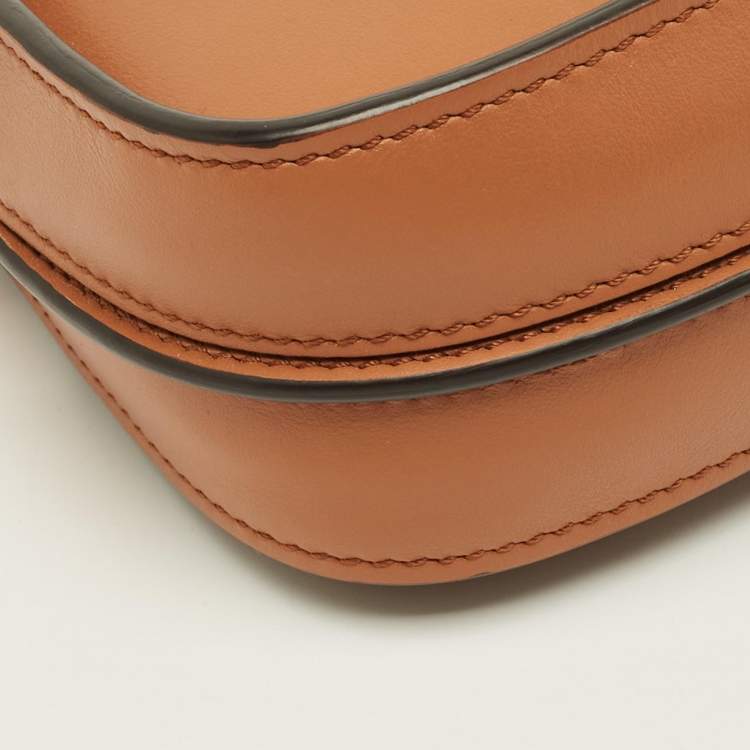 مملوكة مسبقًا حقيبة كلاتش تودز ت-تايمليس جلد بني