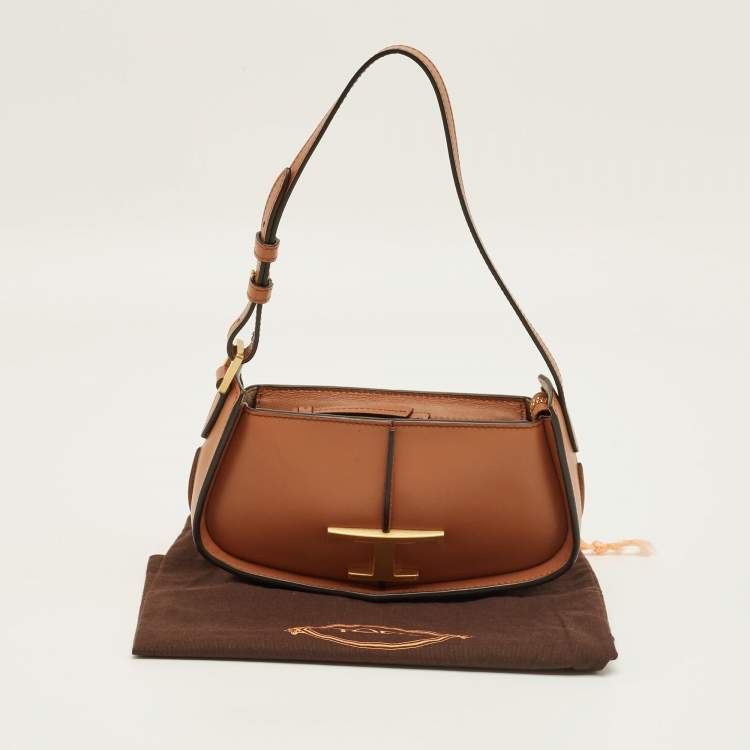 مملوكة مسبقًا حقيبة كلاتش تودز ت-تايمليس جلد بني