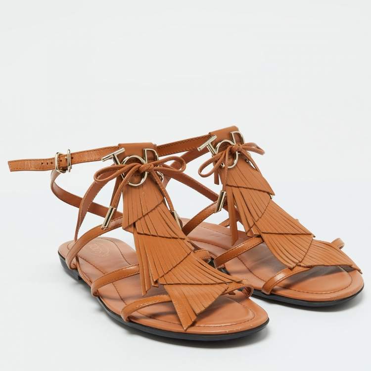 Pre Owned Tod's Tan Leather Fringe Logo Bow Flat Sandals Size 38.5