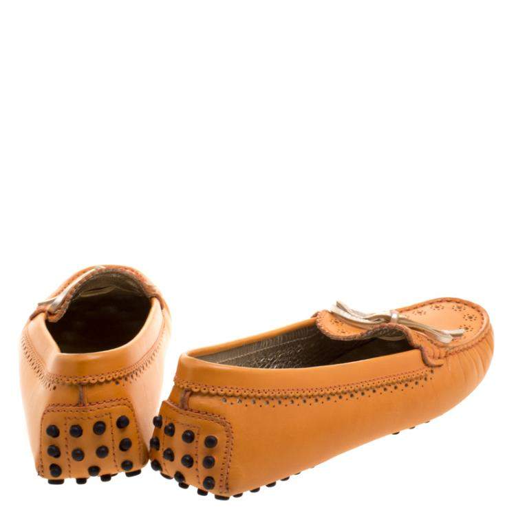 Pre Owned Tod's Orange Perforated Leather Bow Loafers Size 36