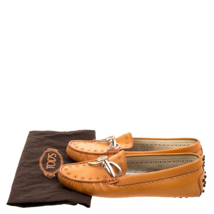 Pre Owned Tod's Orange Perforated Leather Bow Loafers Size 36