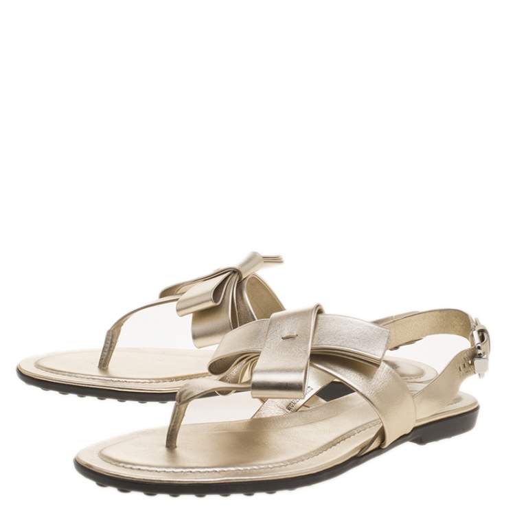 Pre Owned Tod's Metallic Gold Leather Bow Detail Flat Thong Sandals Size 37.5