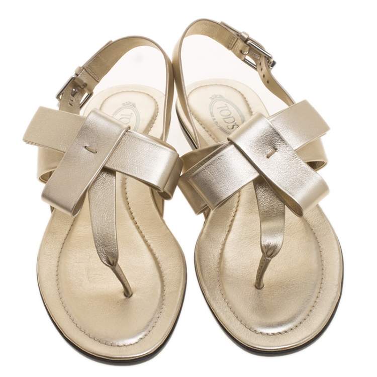 Pre Owned Tod's Metallic Gold Leather Bow Detail Flat Thong Sandals Size 37.5