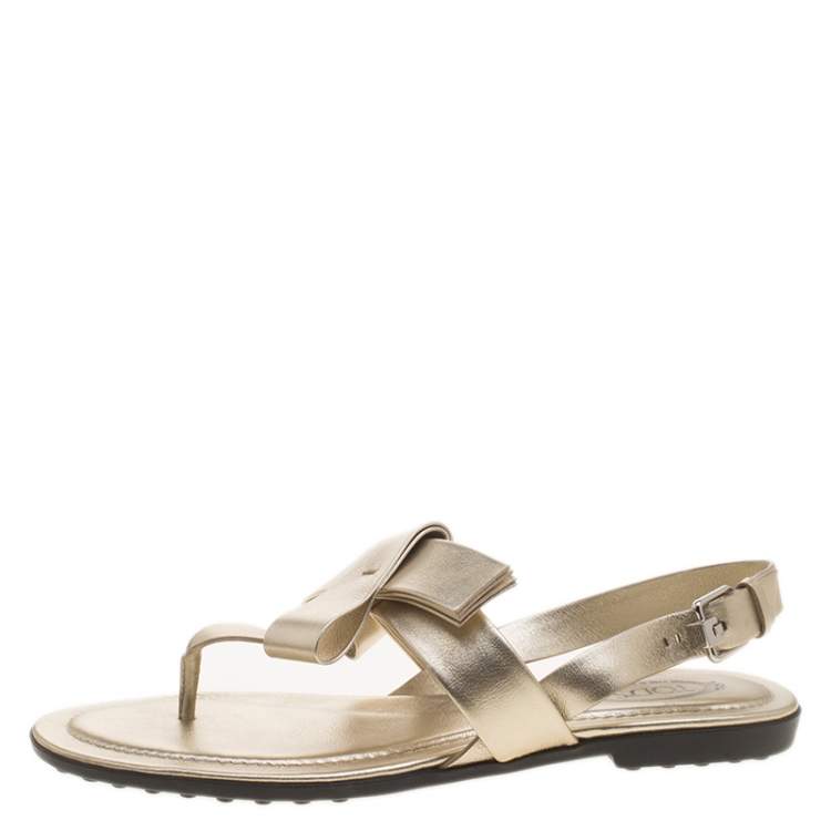 Pre Owned Tod's Metallic Gold Leather Bow Detail Flat Thong Sandals Size 37.5
