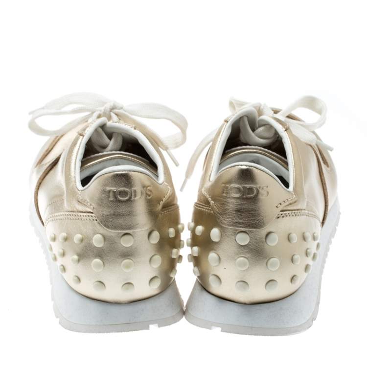 Pre Owned Tod's Metallic Gold Leather Allaciata Studded Lace Up Sneakers Size 39