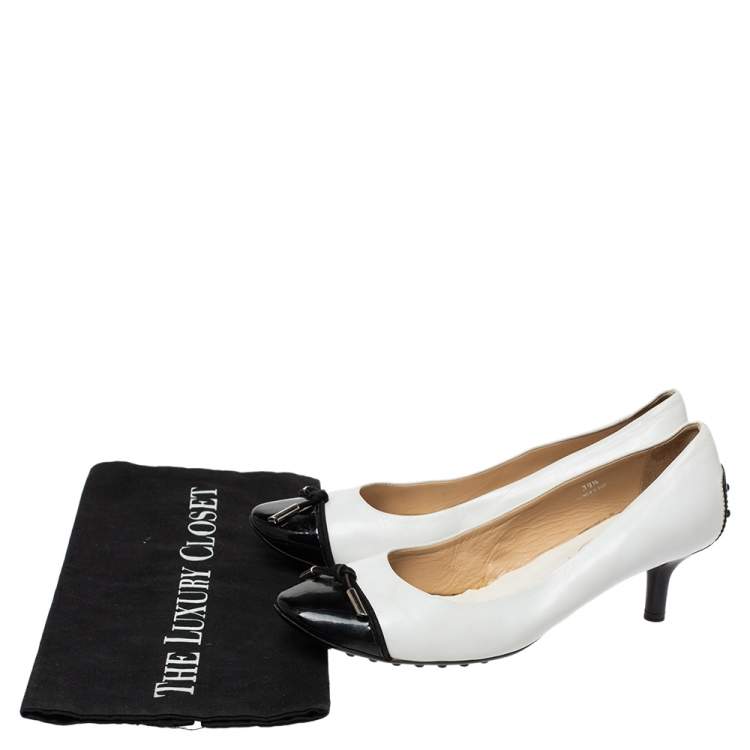 Pre Owned Tod's White Leather And Black Patent Cap Toe Bow Pumps Size 39.5