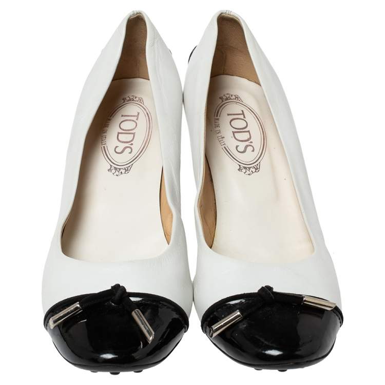 Pre Owned Tod's White Leather And Black Patent Cap Toe Bow Pumps Size 39.5