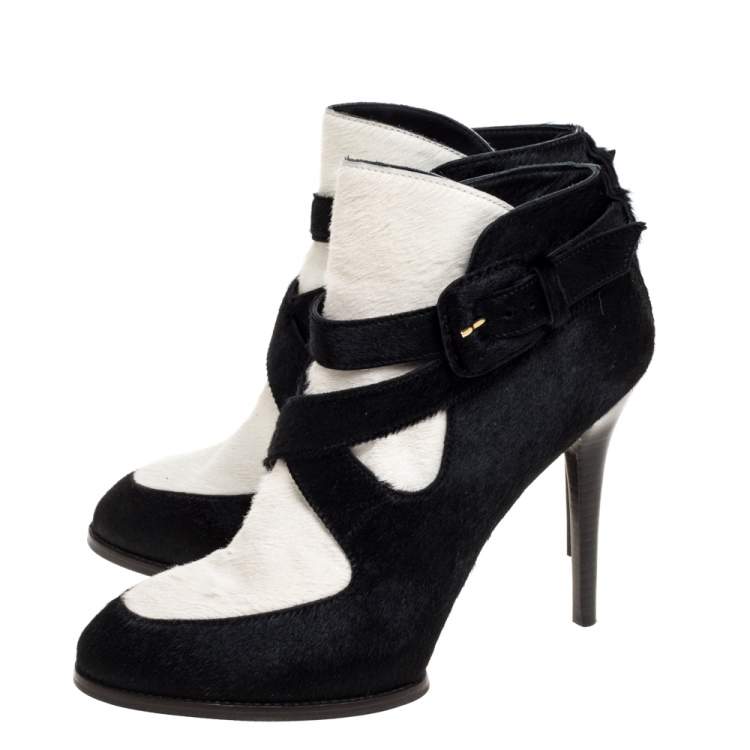 Pre Owned Tod's Black/White Calf Hair Cross Strap Buckle Detail Ankle Boots Size 40
