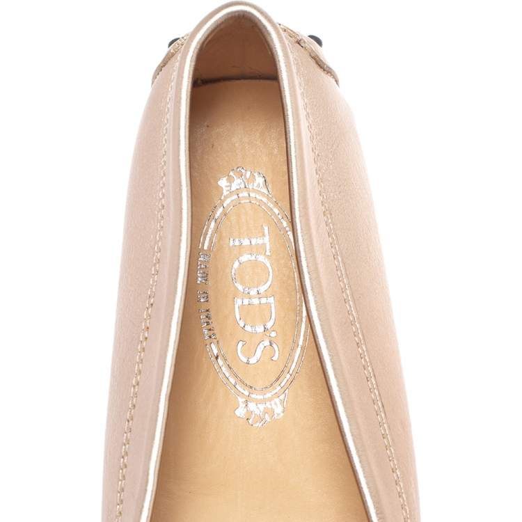 مملوكة مسبقًا Tod's Metallic Gold Leather Penny Loafers Size 39.5