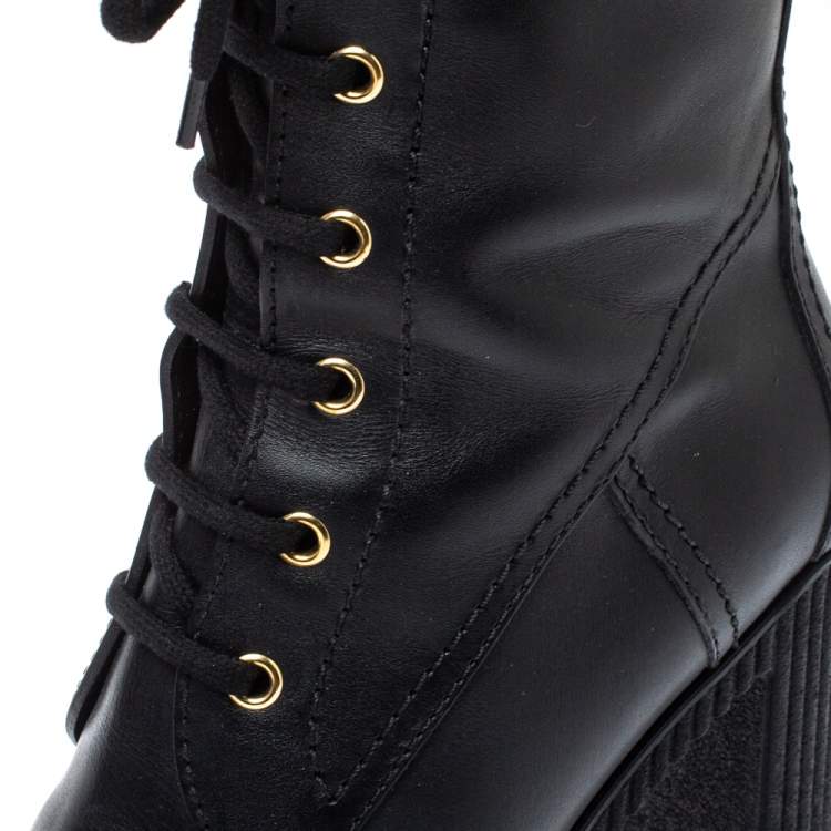 مملوكة مسبقًا Tod's Black Leather Lace Up Block Heel Hiking Mid Length Boots Size 38.5
