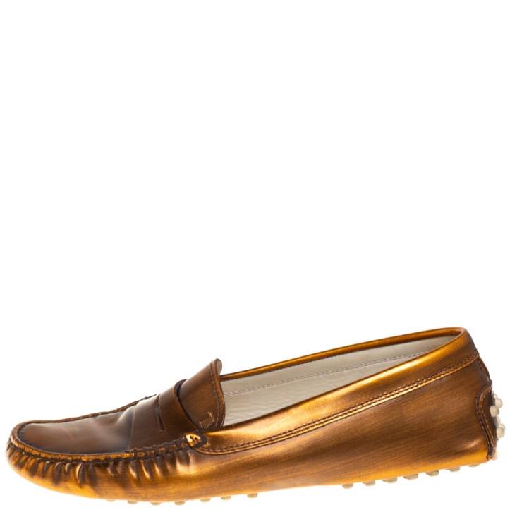 مملوكة مسبقًا Tod's Metallic Brown Leather Slip on Loafers Size 37