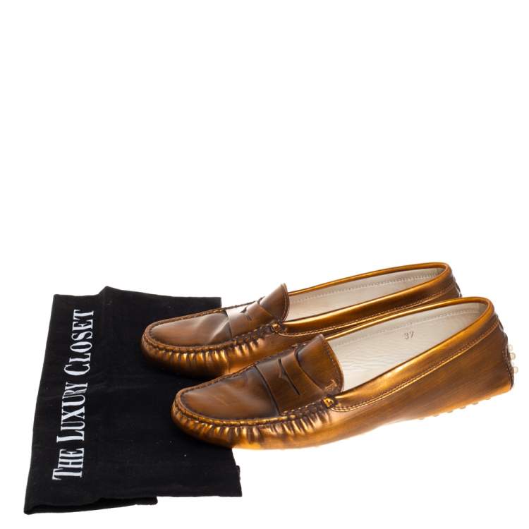 مملوكة مسبقًا Tod's Metallic Brown Leather Slip on Loafers Size 37
