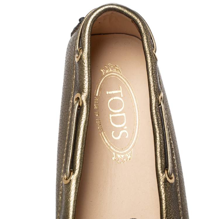 مملوكة مسبقًا Tod's Metallic Bronze Leather Bow Slip On Loafers Size 40