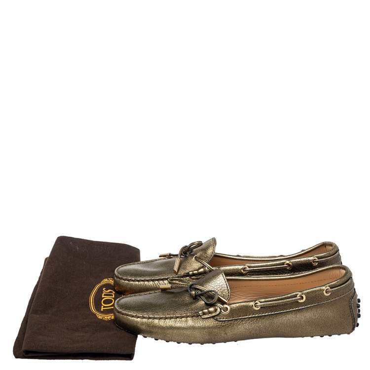 مملوكة مسبقًا Tod's Metallic Bronze Leather Bow Slip On Loafers Size 40