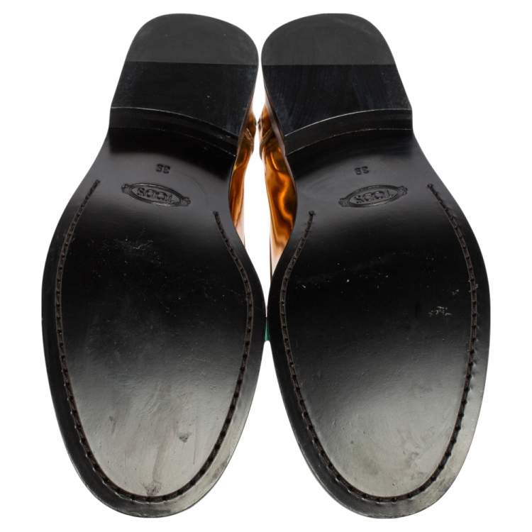 مملوكة مسبقًا Tod's Gold Glossy Leather Penny Loafers Size 39