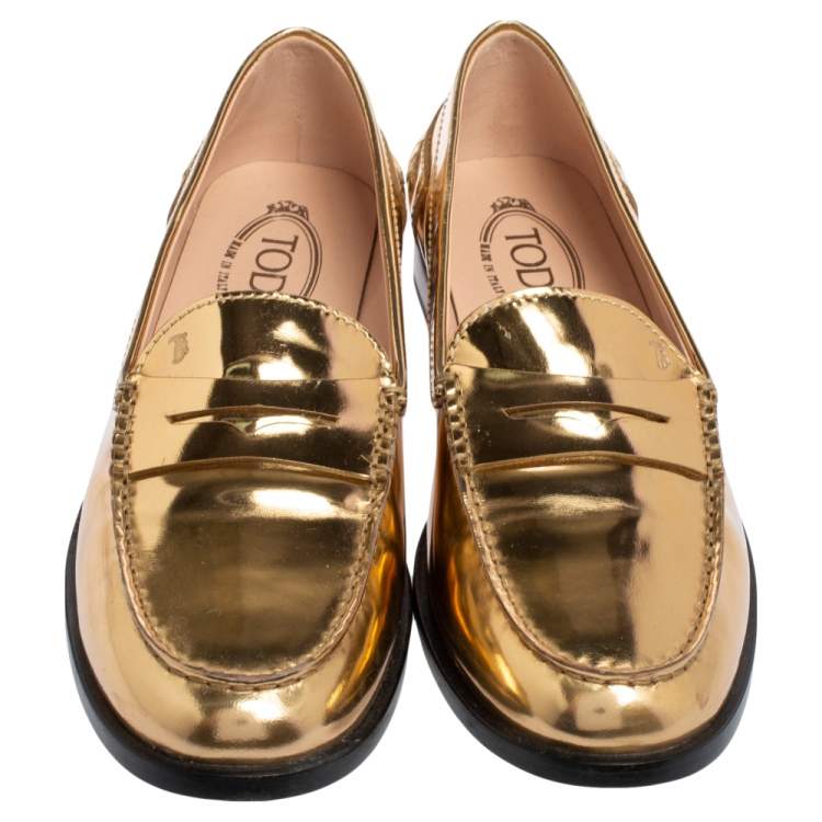 مملوكة مسبقًا Tod's Gold Glossy Leather Penny Loafers Size 39