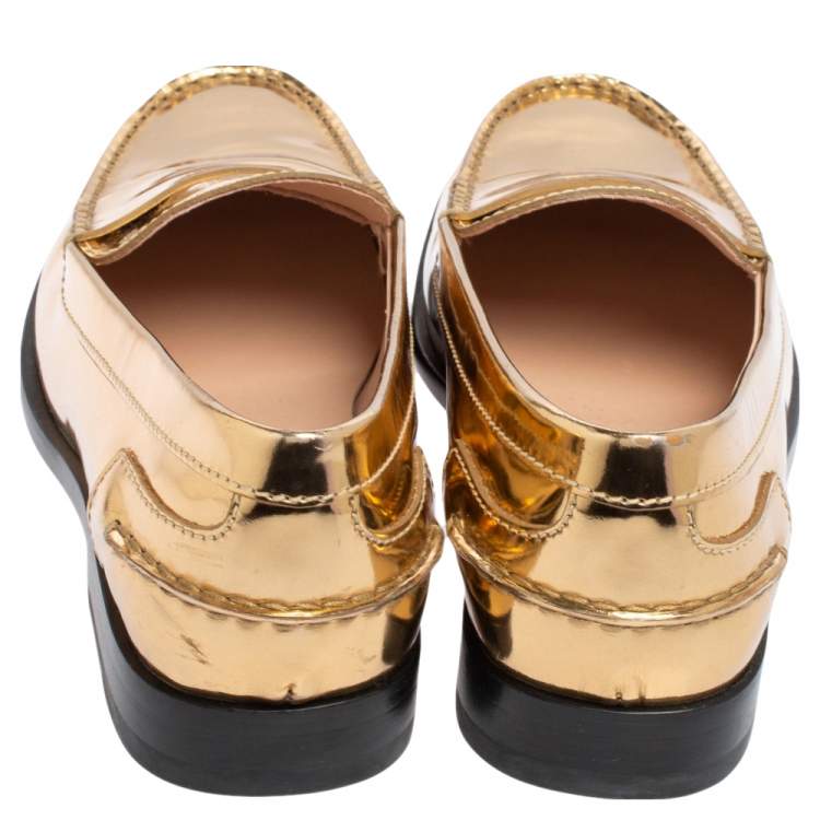 مملوكة مسبقًا Tod's Gold Glossy Leather Penny Loafers Size 39
