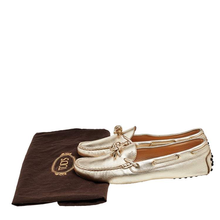 Pre Owned Tod's Gold Leather Bow Slip On Loafers Size 38.5