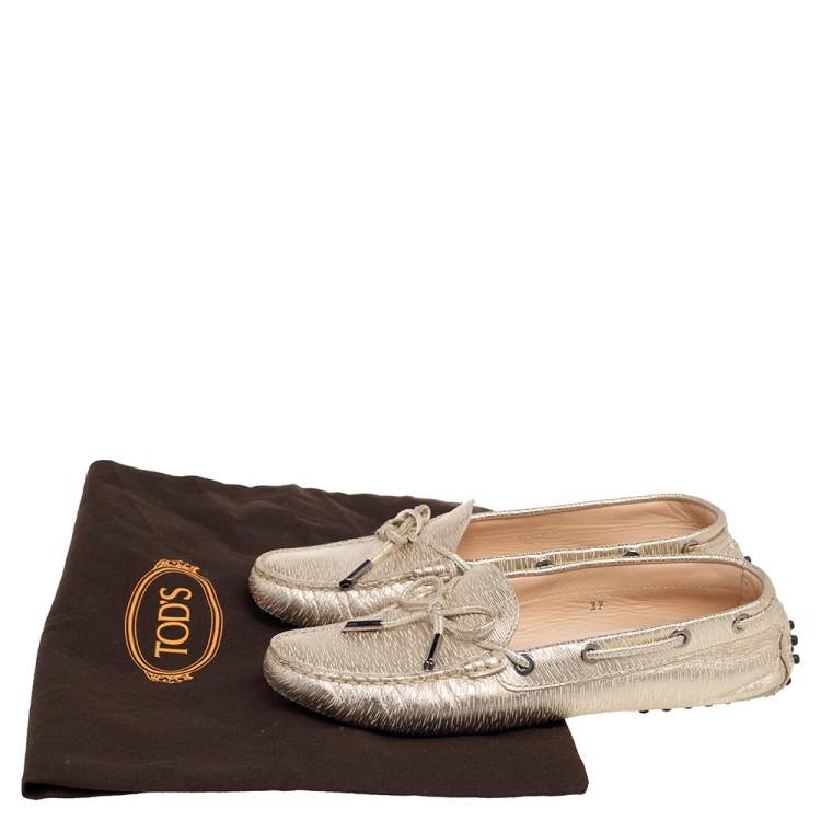 Pre Owned Tod's Gold Textured Leather Bow Detail Driver Loafers Size 37