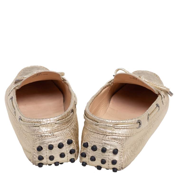 Pre Owned Tod's Gold Textured Leather Bow Detail Driver Loafers Size 37