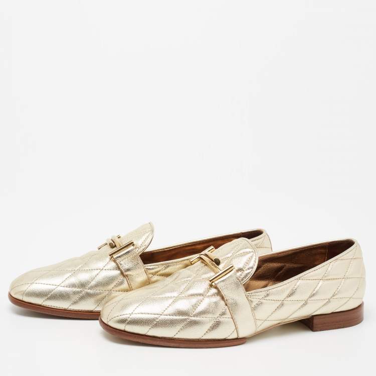 مملوكة مسبقًا Tod's Metallic Gold Quilted Leather Double T Loafers Size 37