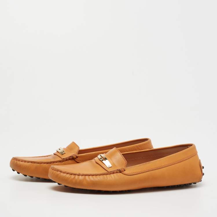 مملوكة مسبقًا Tod's Light Orange Leather Slip On Loafers Size 40.5