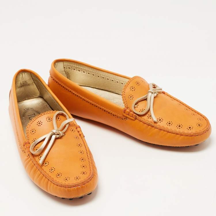 Pre Owned Tod's Orange Perforated Leather Bow Slip On Loafers Size 40.5