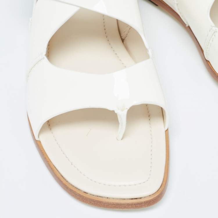 Pre Owned Tod's Cream Patent Leather Cross Strap Flat Sandals Size 36.5