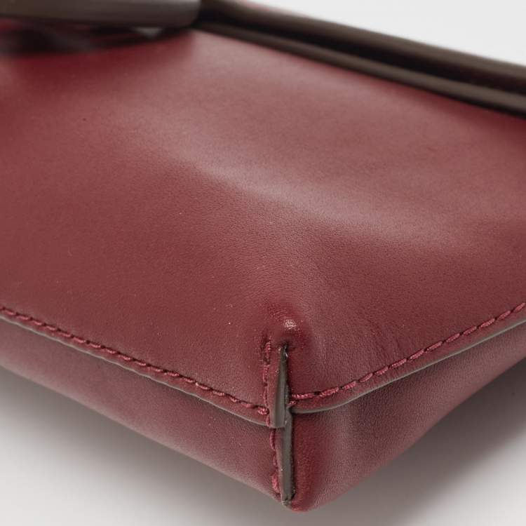 مملوكة مسبقًا Tory Burch Burgundy Leather Miller Clutch