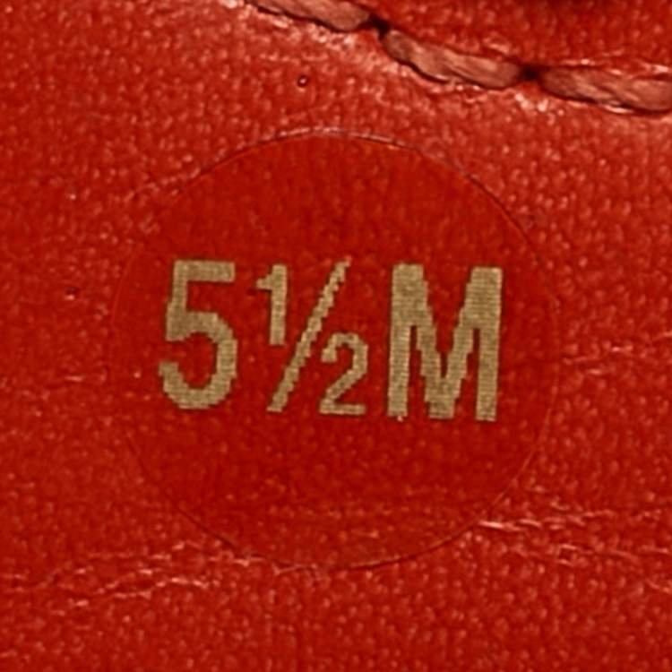 Pre Owned Tory Burch Beige/Orange Canvas and Leather Casey Loafers Size 35.5