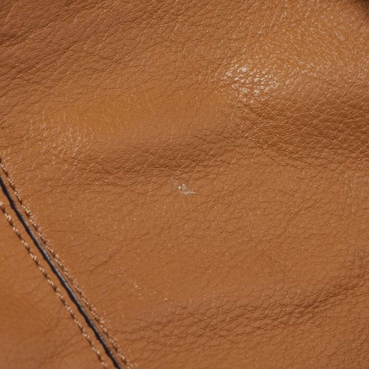 Pre Owned Tory Burch Brown Leather Drawstring Flap Backpack