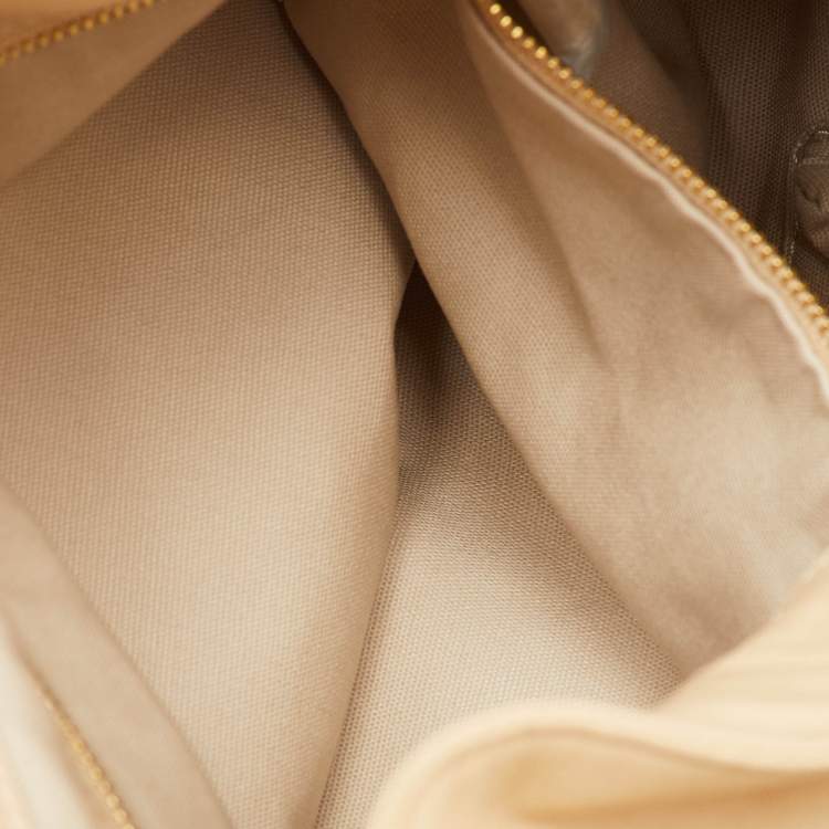 Pre Owned Tory Burch Light Beige Leather Pyramid Studs Hobo
