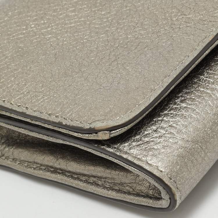 Pre Owned Tory Burch Metallic Grey Leather Logo Embossed Flap Clutch Bag